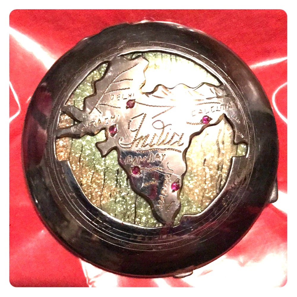 Vintage compact from India.